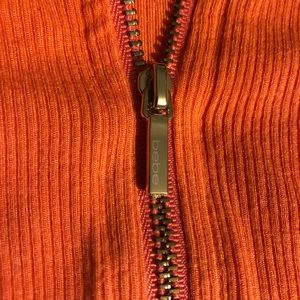 Bebe Knot Zipper Long Sleeve Crop Top